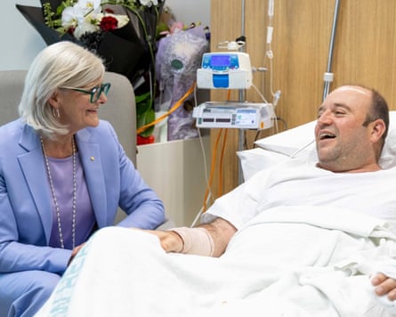 Mostyn visiting Ahmed al-Ahmad in hospital, who disarmed a gunman during the Bondi Beach shooting.