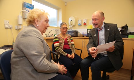 Dr David Unwin and two female patients, all seated in his surgery