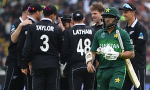 Pakistan’s Imam-ul-Haq walks back to the pavilion after his dismissal.