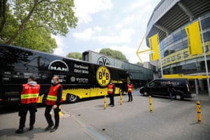 The Borussia Dortmund team coach arrives at the stadium.