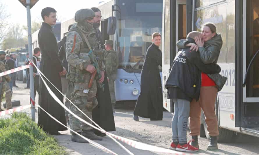 Evacuees from Mariupol arrive at a temporary accommodation centre in Bezimenne