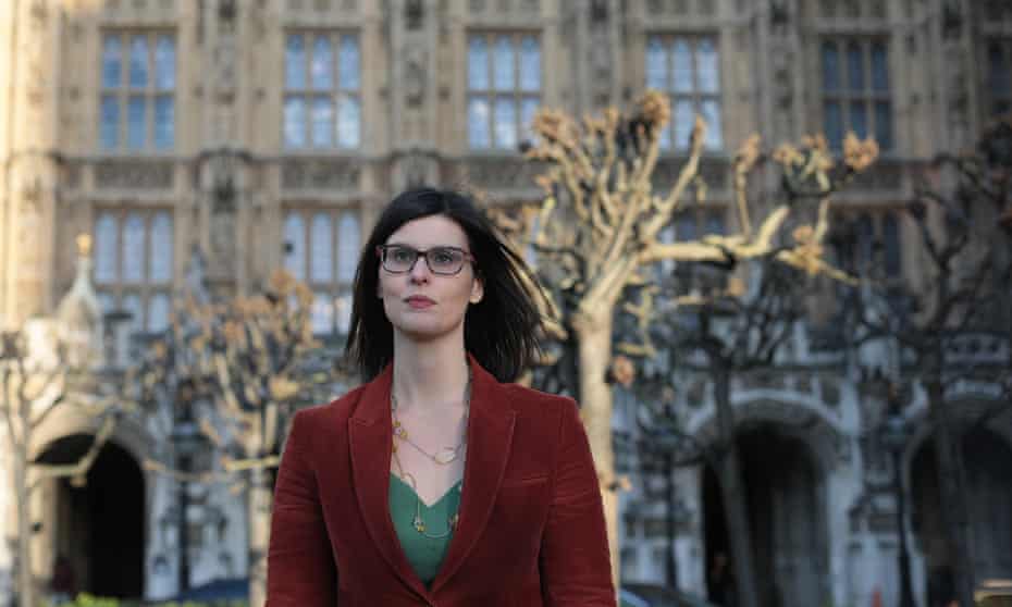 MP Layla Moran stands outside the Houses of  Parliament.