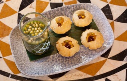 filled puri and tamarind water