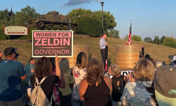 Lee Zeldin stands onstage after an attack on him during an event in Fairport, New York, on 21 July.