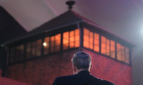 Jewish man contemplates building