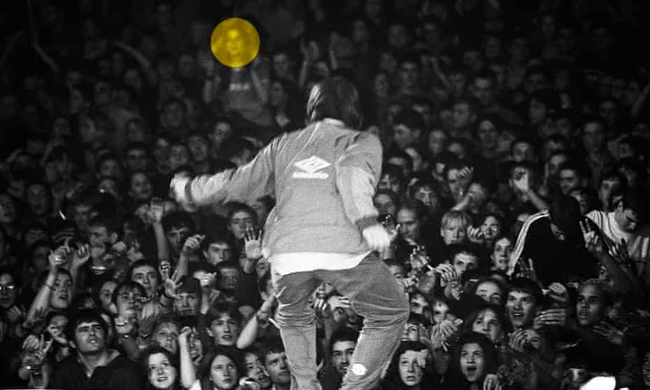 Photograph of Rebecca Barnaby in crowd at Oasis gig