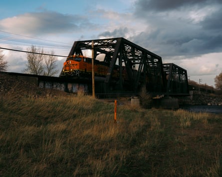 A coal and oil train running through Livingston.