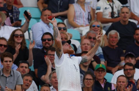 England's Ben Stokes takes a catch to dismiss Australia's Pat Cummins off the bowling of Joe Root.