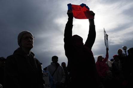 a person holding a sign