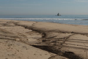 The spill from an off-shore oil rig blackened the sand at Huntington Beach.