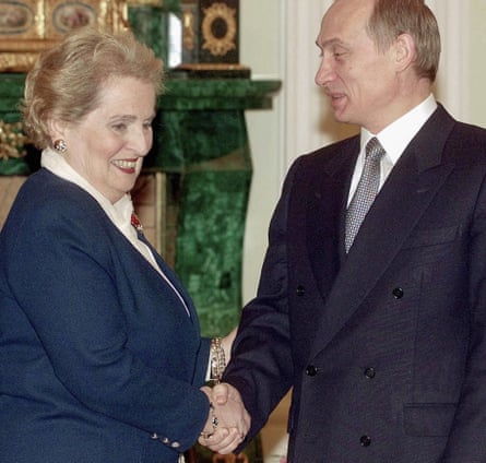 Madeleine Albright shakes hands with Vladimir Putin in Moscow in February 2000.