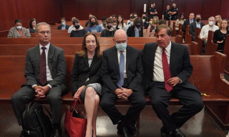 Allen Weisselberg (in mask) with his legal team before a hearing at Manhattan State Supreme Court in New York, 18 August 2022. 