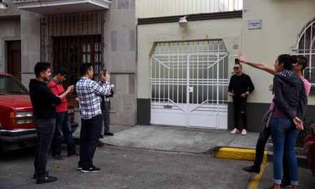 MEXICO-CINEMA-ROMA<br>Tourists take pictures on January 19, 2019 in front of the house where the Netflix film Roma, with 10 Oscar nominations, was filmed in Mexico City. - The resounding success of “Roma”, made by Mexican filmmaker Alfonso Cuaron, has sparked an unexpected pilgrimage of film enthusiasts eager to be photographed in the Mexico City neighborhood where it was shot. (Photo by RODRIGO ARANGUA / AFP)RODRIGO ARANGUA/AFP/Getty Images