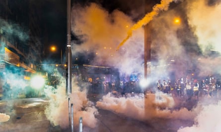 Hong Kong Police fire teargas during an anti-extradition bill march in Hong Kong on Sunday.