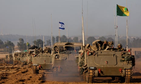 A convoy of Israeli tanks and armoured personnel carriers after leaving Gaza during the temporary truce.