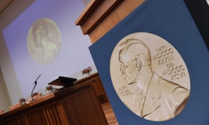 Alfred Nobel dominates the speaker's desk at the Nobel Forum in Stockholm