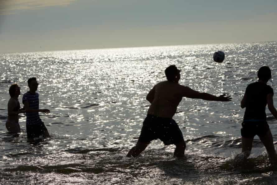 Nottingham students play rugby in the sea during a four-day break in Blackpool