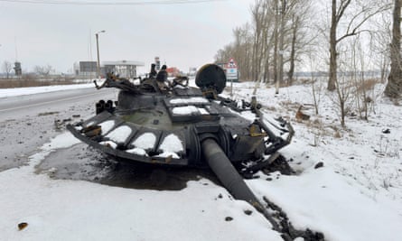 A destroyed Russian tank on a roadside in the outskirts of Kharkiv on Saturday.