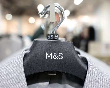 Clothes on an M&S branded hanger in store