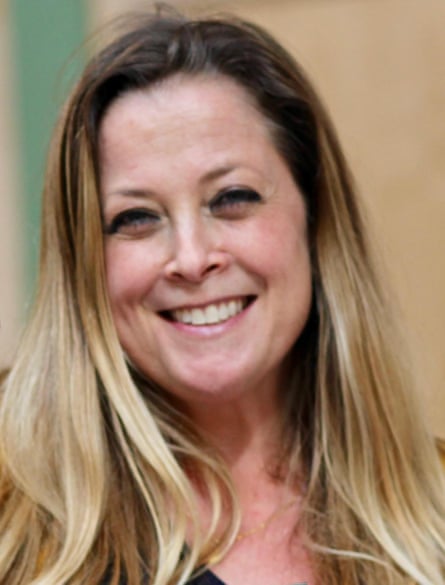 Portrait of Annabel Rook smiling widely. She has long, straight blond hair.