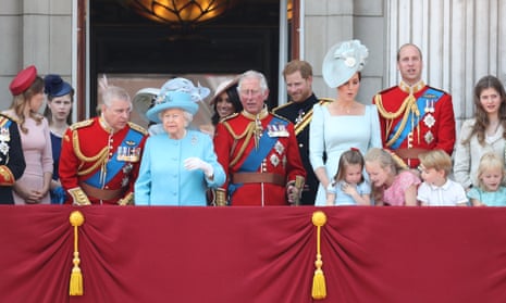 Prince Andrew talks with the Queen as the royal family wave from the balcony of Buckingham Palace after Trooping the Colour in June 2018. 