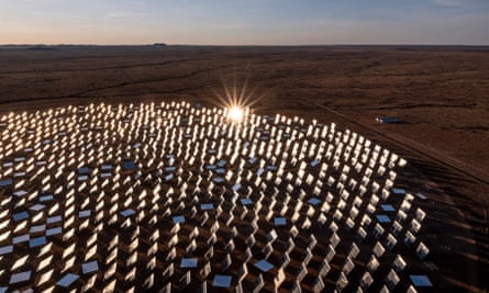 Heliostats under sunlight at a thermal solar power plant in Upington, South Africa