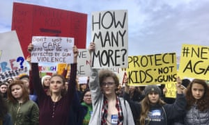 Students at Roosevelt high school take part in a protest against gun violence Wednesday, 14 March 2018, in Seattle.