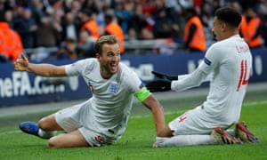 Harry Kane celebrates his late winner at Wembley.
