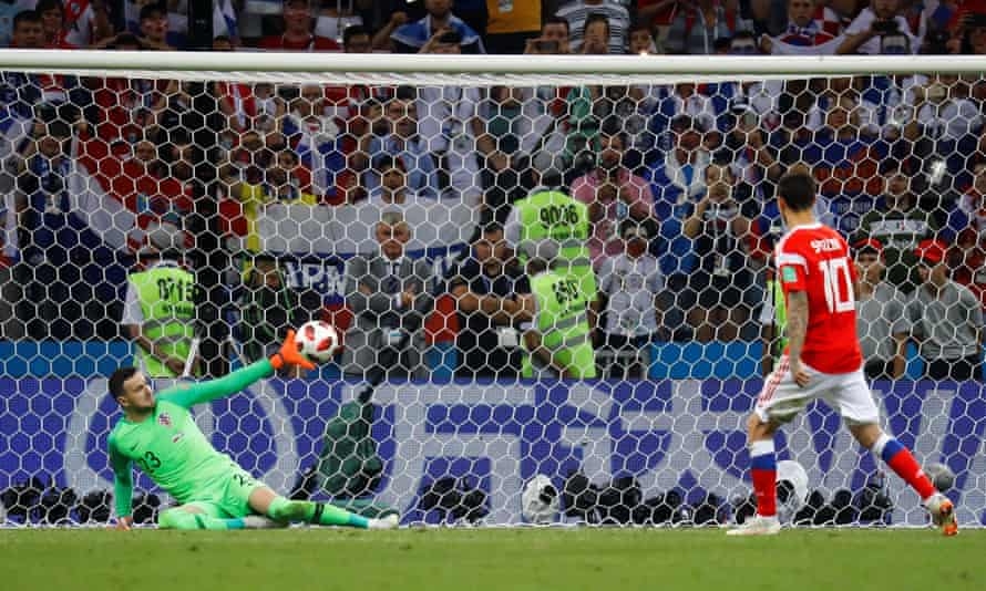Croatia’s Danijel Subasic saves a penalty from Russia’s Fyodor Smolov during the shootout.