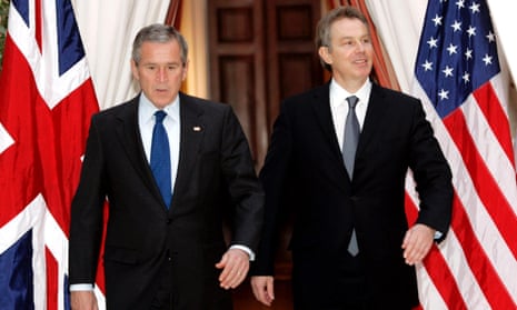 File photo of U.S. President Bush walking with British Prime Minister Blair in BrusselsU.S. President George W. Bush (L) and British Prime Minister Tony Blair walk together from their meeting at the U.S. Embassy in Brussels, February 22, 2005. REUTERS/Kevin Lamarque/File Photo