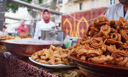 Middle Eastern pastries for sale at a food market in Paris.