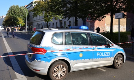 Police secure the area after two molotov cocktails were thrown at the Skoblo Synagogue and Education Centre overnight in Berlin.