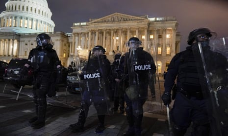 Authorities remove protesters from the U.S. Capitol, Wednesday, Jan. 6, 2021, in Washington. (AP Photo/Jacquelyn Martin)