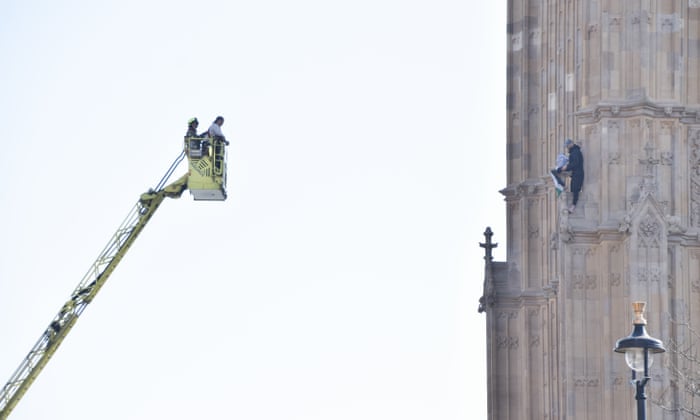 Palestine protester safely brought down from Big Ben clock tower after 16 hours | Protest | The Guardian