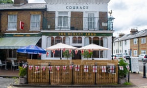 Covid live news: UK reports 31,772 daily infections and 26 new deaths; new restrictions in Libya after record cases | World news 7 A pub in Windsor today ahead of tonight’s England Euro 2020 final with Italy.