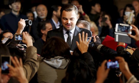 Oscar-winning actor Leonardo DiCaprio signs autographs for fans during the Japan premiere of his movie “The Revenant” in Tokyo, Japan<br>Oscar-winning actor Leonardo DiCaprio (C) signs autographs for fans during the Japan premiere of his movie “The Revenant” in Tokyo, Japan, March 23, 2016. REUTERS/Toru Hanai TPX IMAGES OF THE DAY