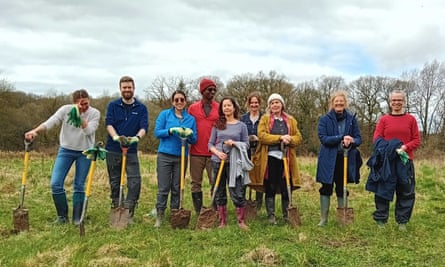 The retreat group (author Jane Dunford is centre) after their hedgerow planting efforts.