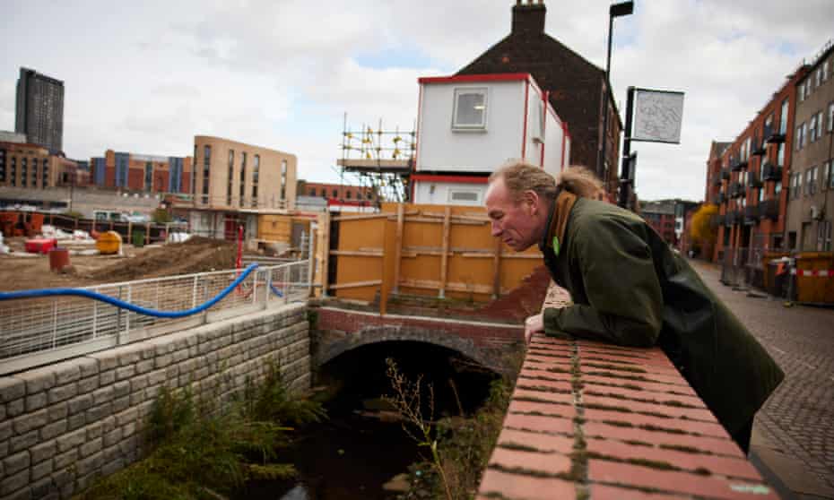 Douglas Johnson, Green councillor, at Porter Brook running through an industrial area of Sheffield city centre