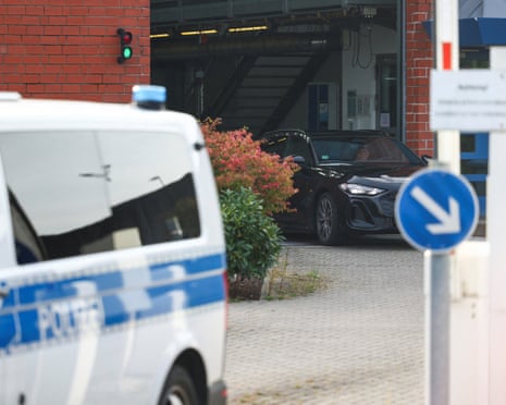 A car believed to be carrying the man who was formally identified in 2020 as a suspect in the case of the disappearance of British toddler Madeleine McCann leaves after his release from prison in Sehnde, Germany.