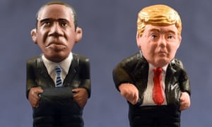 Ceramic figurines, called caganers (poopies), represent Barack Obama and Donald Trump. The figurines symbolize fertilization, hope and prosperity for the coming year.