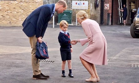 Prince George arrives with the Duke of Cambridge at Thomas’s Battersea in London.