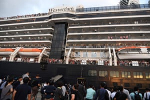 Passengers leave the Westerdam cruise ship in Sihanoukville, Cambodia on Friday.