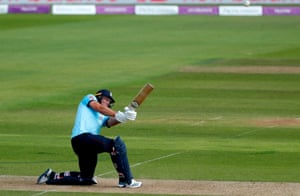 England’s David Willey hits a six.