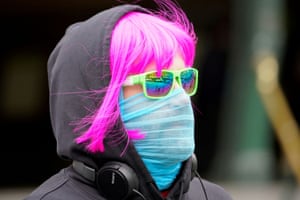 A person wears a scarf as a protective face mask in Melbourne.