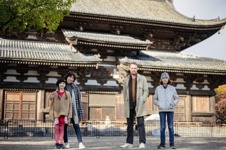 Scott in Kyoto, where he moved with his family (pictured with him) after he watched the film The Last Samurai