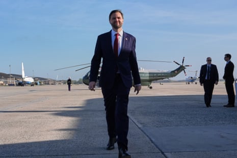 JD Vance walking towards media cameras.