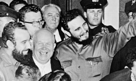 Fidel Castro stands with Soviet leader Nikita Khrushchev, center left, outside Hotel Theresa in Harlem, New York, in 1960.
