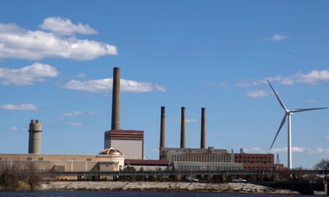 The turbine at the Massachusetts Water Resources Authority DeLauri pump station stands with the natural gas-fired Mystic generating station as a backdrop in Charlestown, Massachusetts.