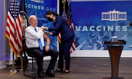 Joe Biden received his vaccine booster in public but may have undermined the message by declaring the pandemic “over”.