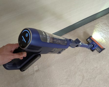 The Shark IA3241UKT vacuum cleaner in use on carpet.
